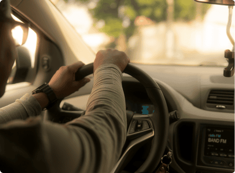 hands on a steering wheel