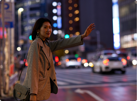 Woman hailing a cab